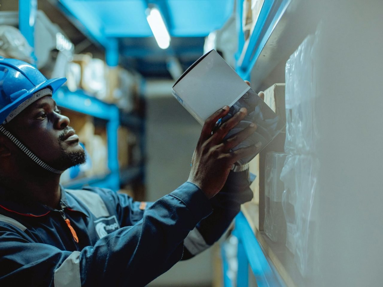 Operations worker verifying a delivery document